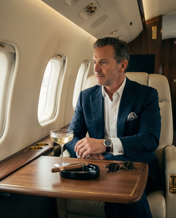 Private jet executive headshot, Tom Ford suit, Patek watch