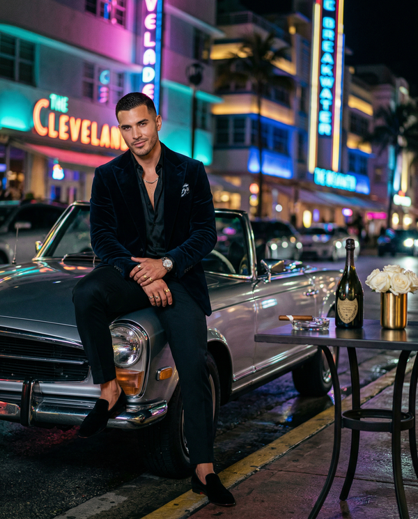Tom Ford velvet blazer model on Ocean Drive neon night in Miami