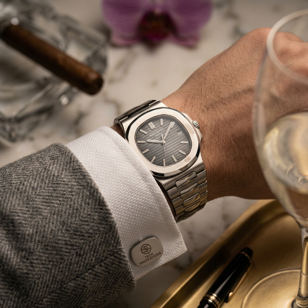 Macro Patek Nautilus on Calacatta marble with cashmere cuff