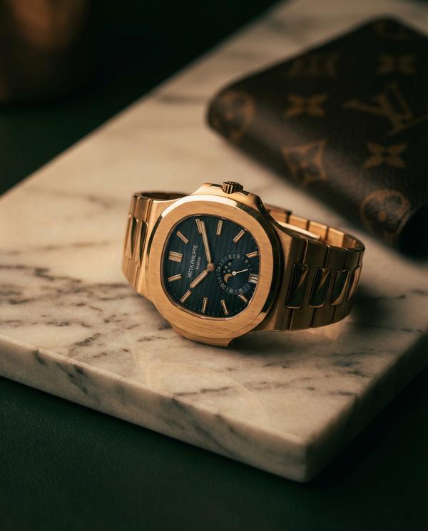 Detail of an exclusive wristwatch, showcasing luxury and sophistication