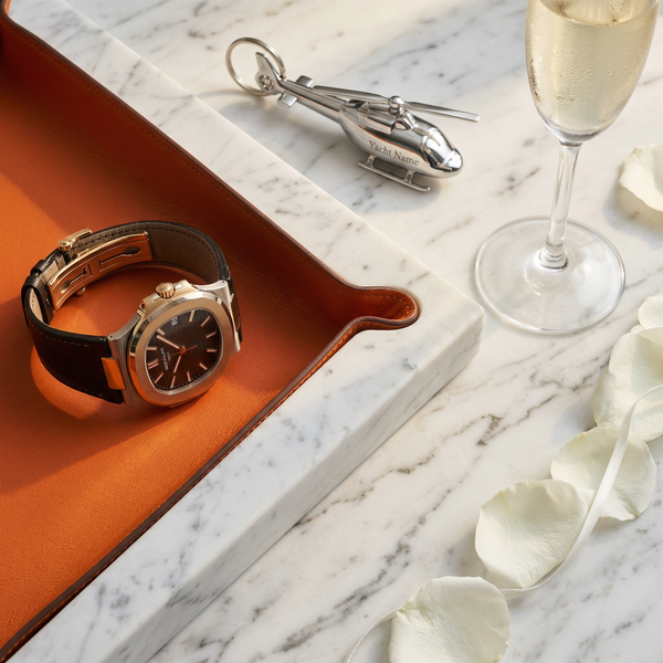 Patek Philippe Nautilus on Carrara marble valet tray with Hermes