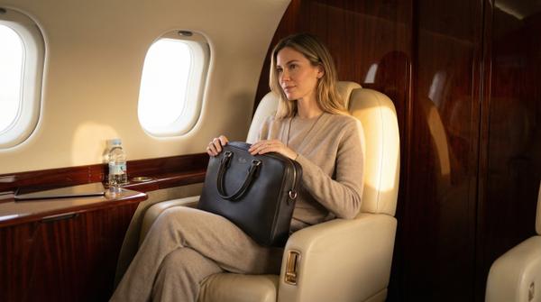 Private jet luxury interior, featuring plush seating and exclusive amenities for elite travelers