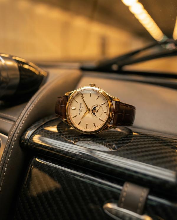 Close-up of luxury car watch detail with elegant design
