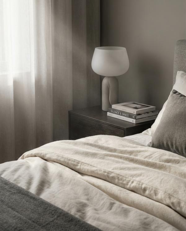 Detail shot of a luxury bedroom featuring stylish decor and comfort