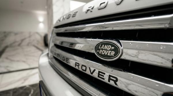 Detailed view of a Range Rover in an elegant marble garage