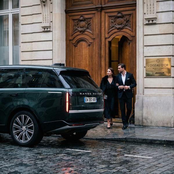 Range Rover outside a Michelin-starred restaurant, exuding luxury
