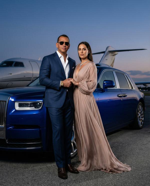Power couple enjoying their Rolls Royce Phantom