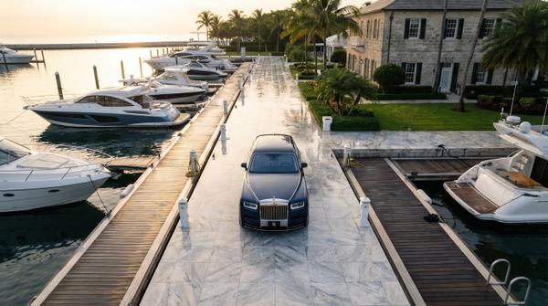 Rolls Royce Phantom parked at a prestigious yacht club